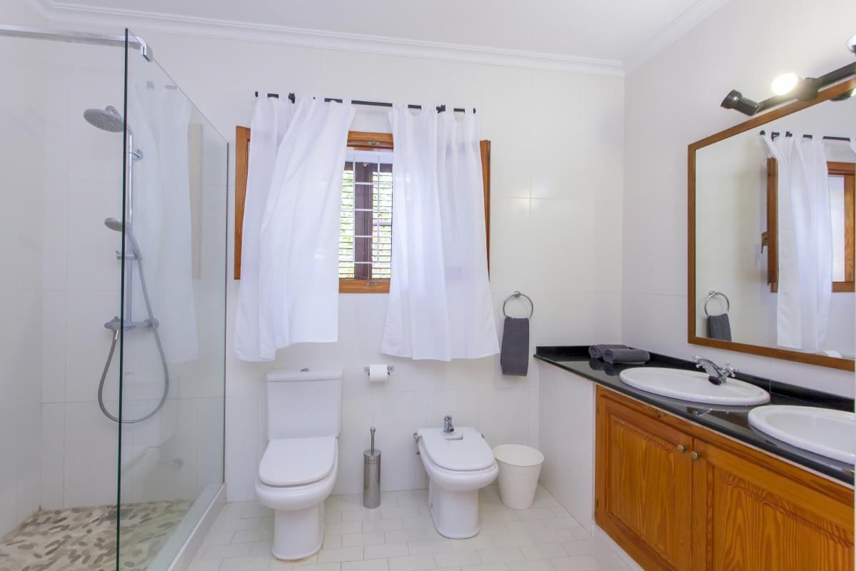 Bathroom with shower wc double washbasin and bidet